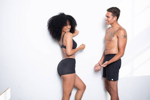 woman and man wearing black underwear