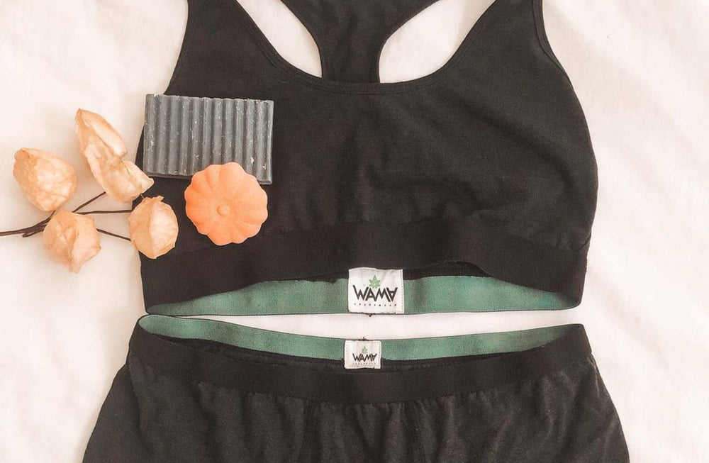 Flat lay image of a WAMA racerback bralette and hipster panties