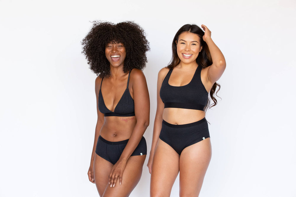 There’s no bra strap falling down in this image of two women wearing correct-fitting bras.