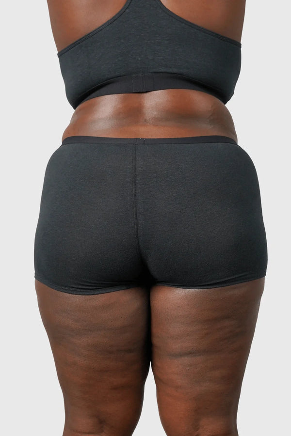 Back view of Hemp Boy Shorts underwear in black on model wearing size 2XL, 5'8" dress size 14