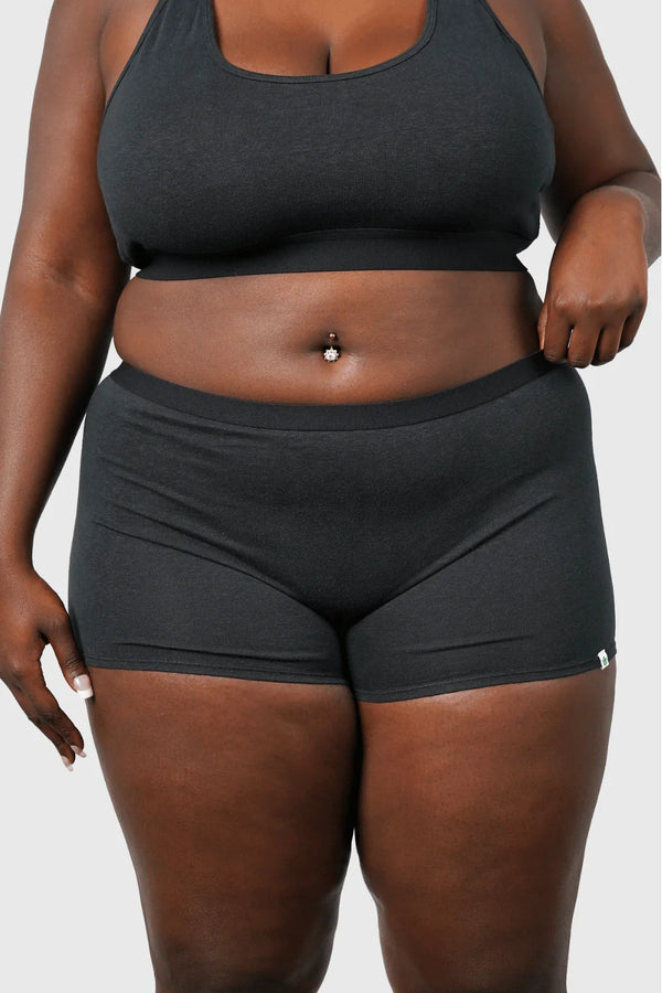 Front view of Hemp Boy Shorts underwear in black on model wearing size 2XL, 5'8" dress size 14