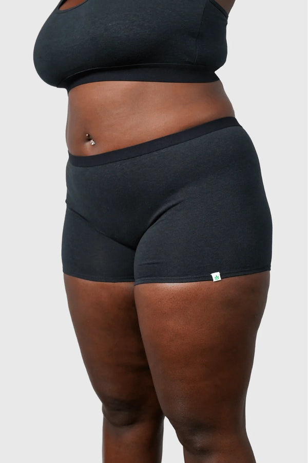 Side view of Hemp Boy Shorts underwear in black on model wearing size 2XL, 5'8" dress size 14