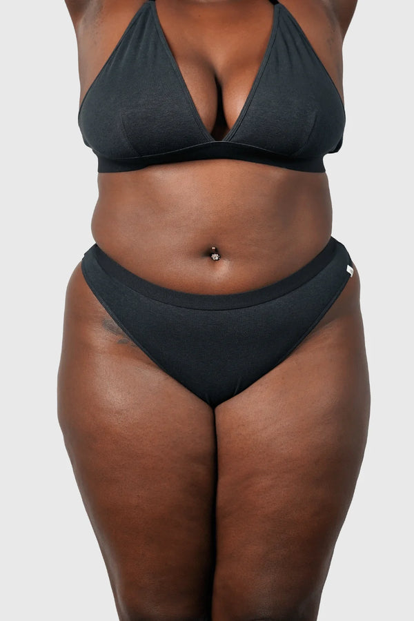 Front view of Hemp Thong underwear in black on model wearing size 2XL, 5'8" dress size 14