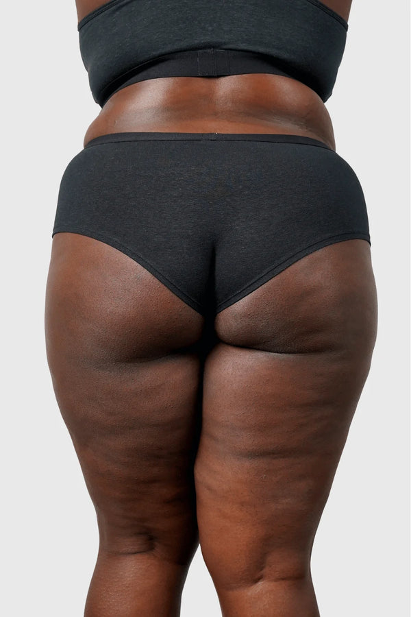 Back view of Hemp Hipster Panties in Black on model Jakarra wearing size 2XL, 5'8 dress size 14