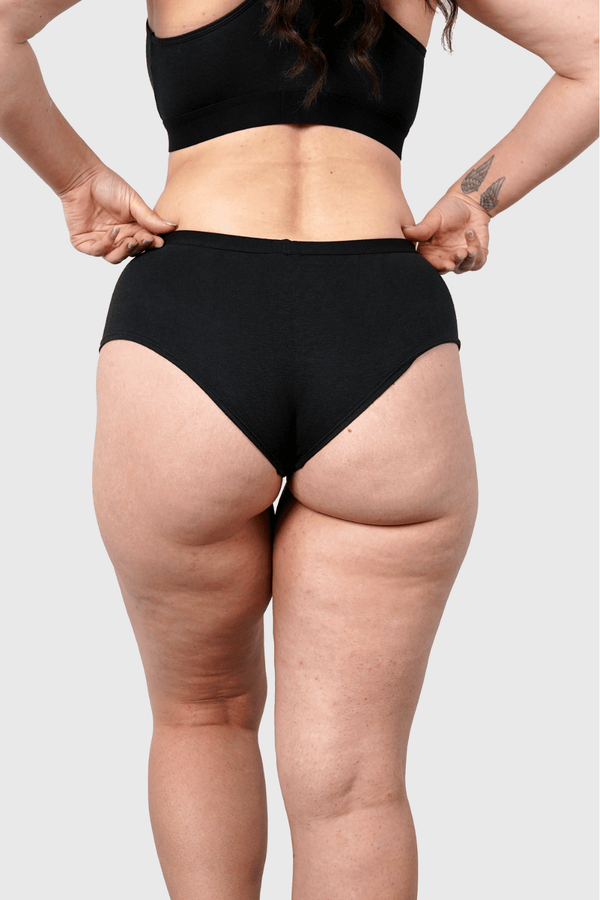 Back view of Hemp Hipster Panties in Black on model wearing size M, 5 ft 10 in dress size 6