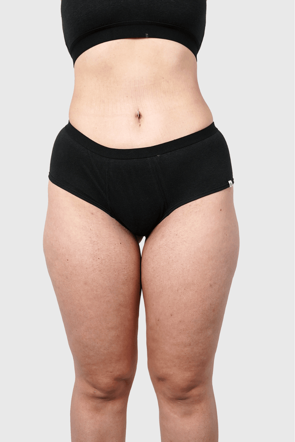 Front view of Hemp Hipster Panties in Black on model wearing size M, 5 ft 10 in dress size 6