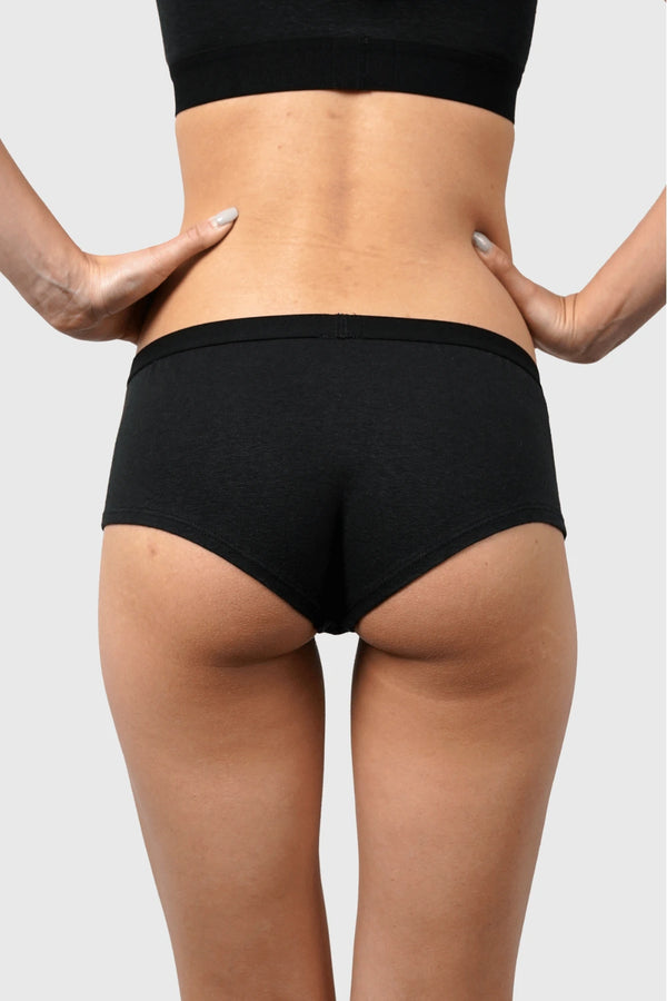 Back view of Hemp Hipster Panties in Black on model wearing size S (5'10", dress size 2)