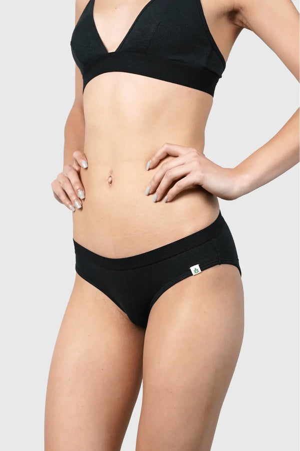 Side view of Hemp Bikini in Black on model wearing size S, 5'10” dress size 2