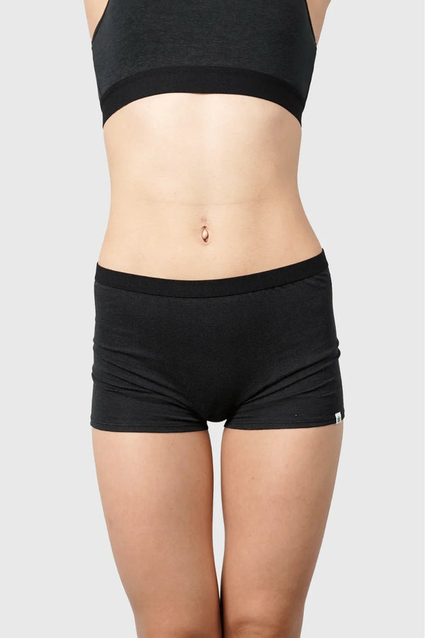 Front view of Hemp Boy Shorts in Black on model wearing size S, 5'10" dress size 2