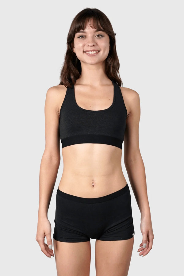 Full-body view of Hemp Boy Shorts in Black on model wearing size S, 5'10" dress size 2